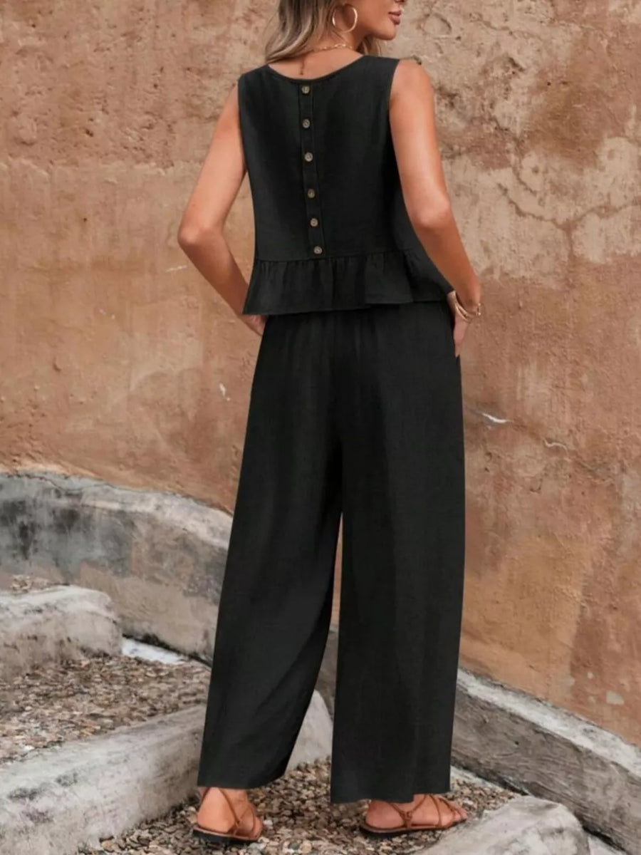 Black ruffled peplum top with button back and wide-leg pants set