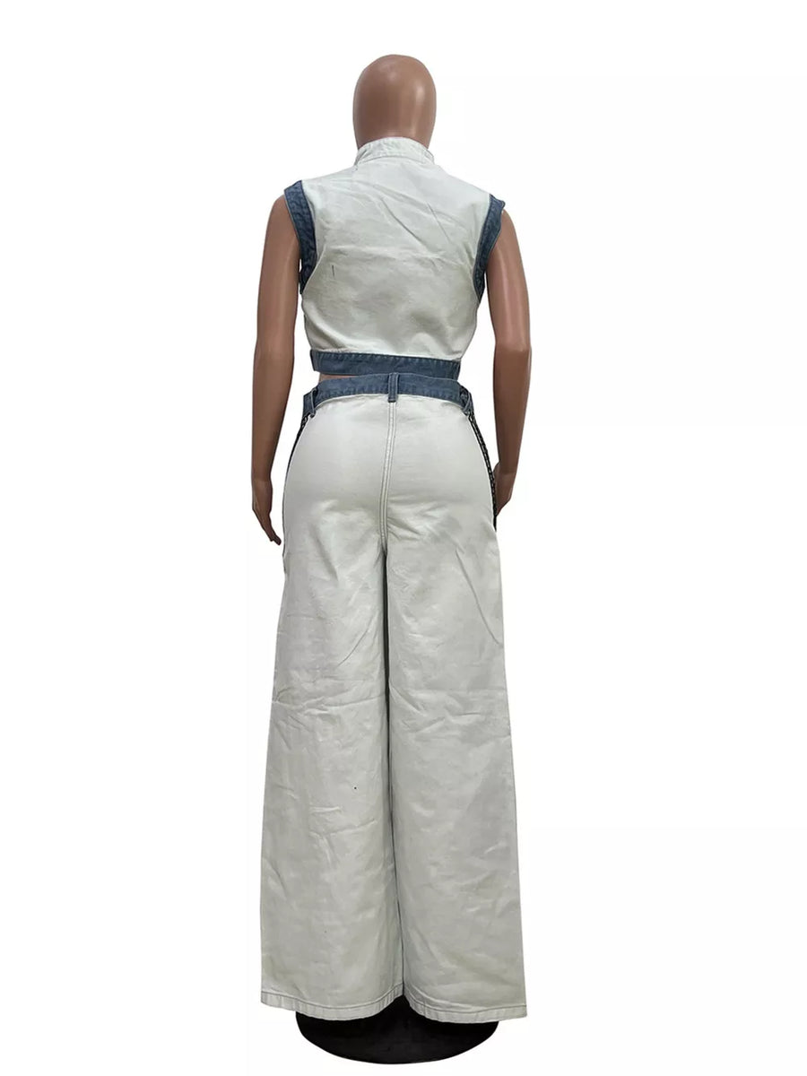 White zip-front crop top and wide-leg pants set with denim trim.