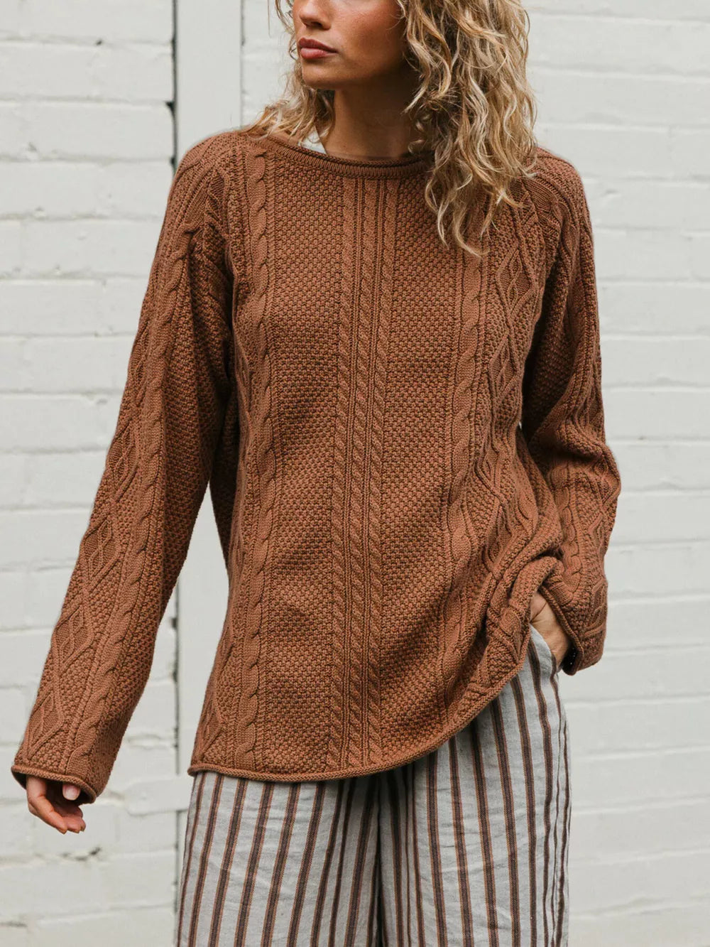 100% polyester Care instructions: Machine wash cold pullover sweater in Beige with relaxed silhouette