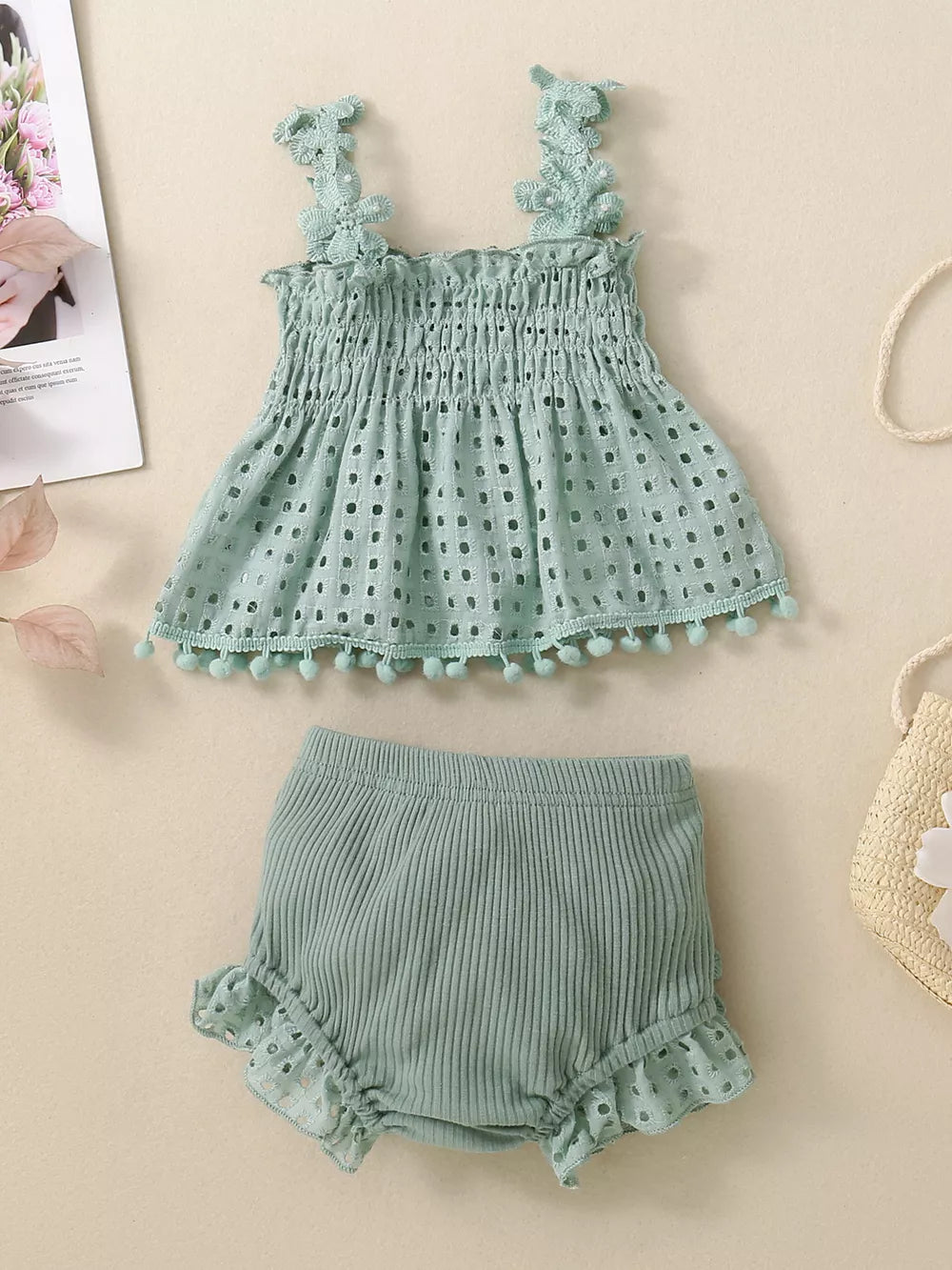 Green eyelet tank with pom pom trim and ruffled bloomers set.