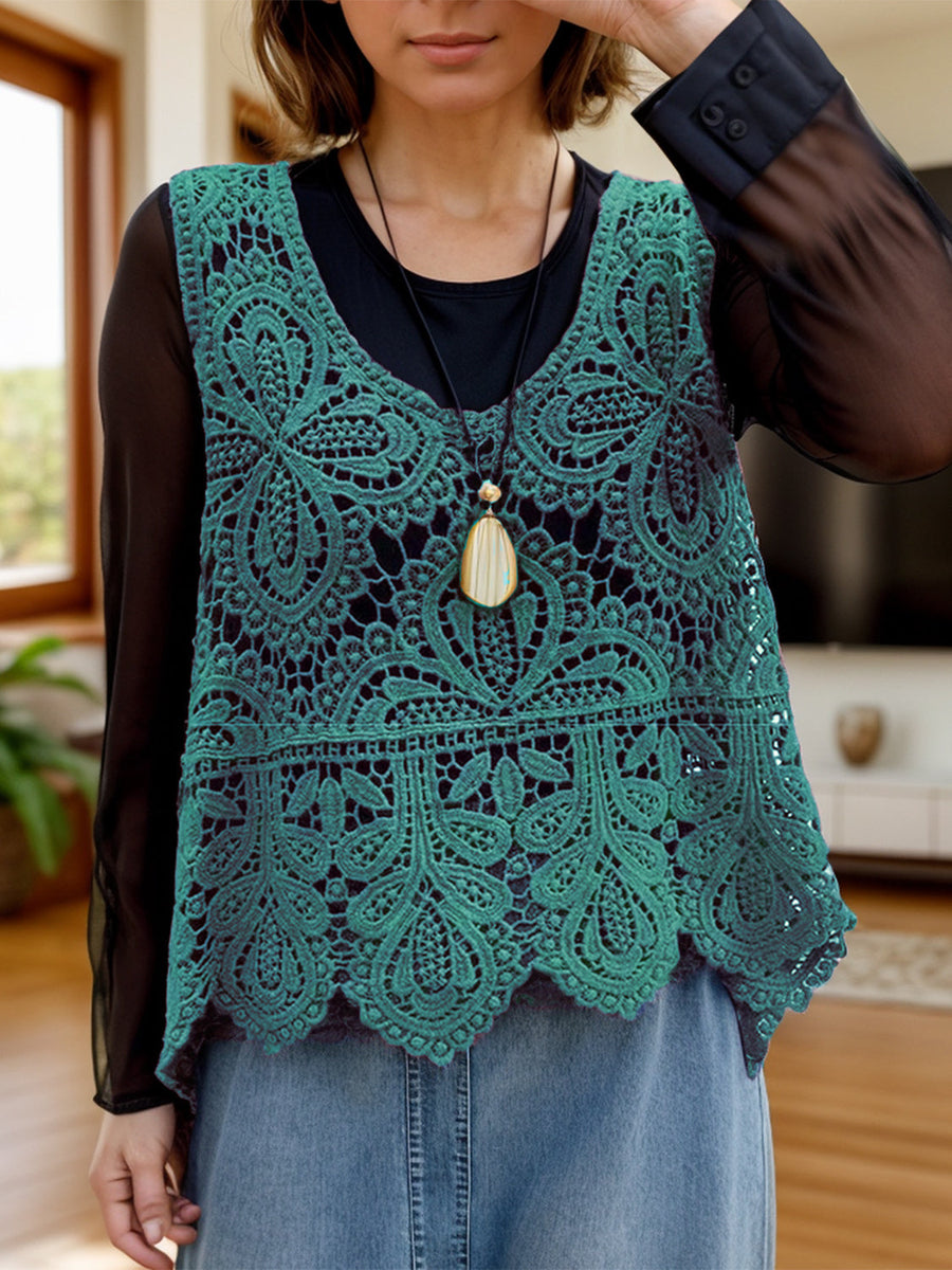 Turquoise lace overlay cropped vest with intricate floral pattern and scalloped hem.