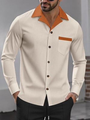 orange button-up shirt featuring buttoned and textured