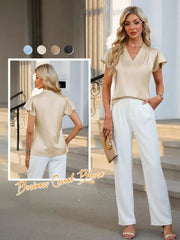 Apricot satin V-neck flutter sleeve blouse with a draped bodice.