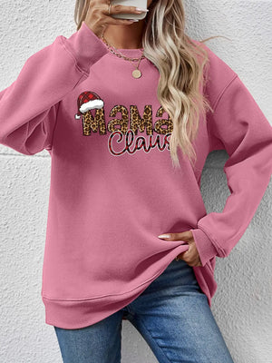 Blush pink crewneck sweatshirt with leopard print "Mama Claus" graphic and Santa hat detail.