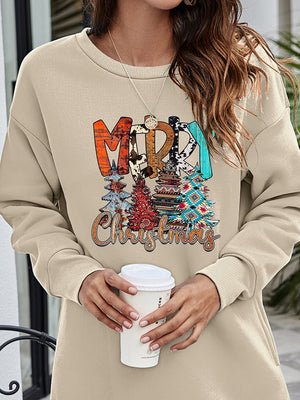 Beige extended hemline sweatshirt with a festive "Merry Christmas" graphic and stylized trees.