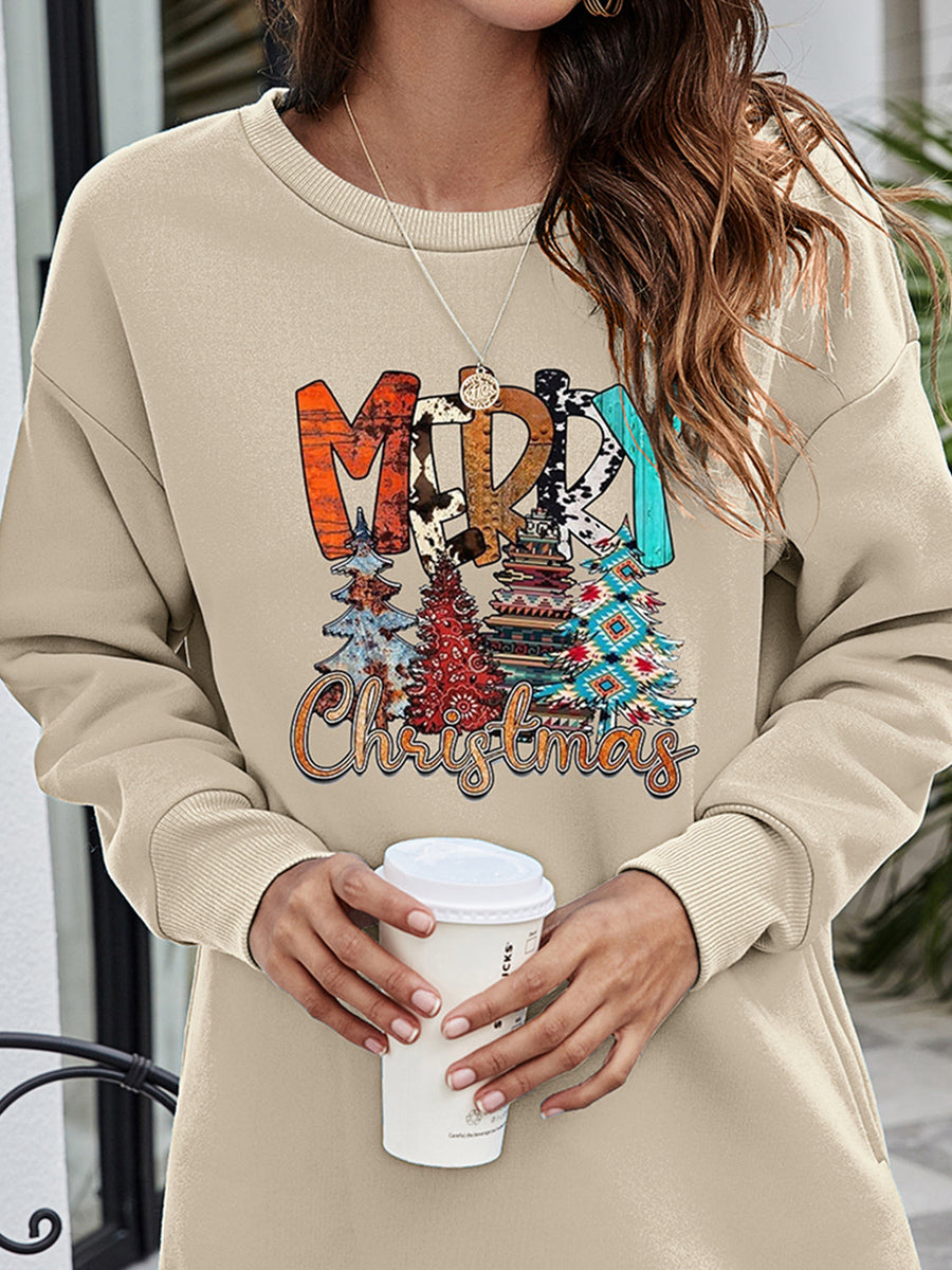 Beige extended hemline sweatshirt with a festive "Merry Christmas" graphic and stylized trees.