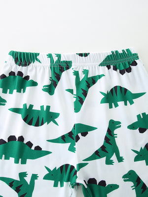Baby shorts with white cotton blend and green dinosaur print