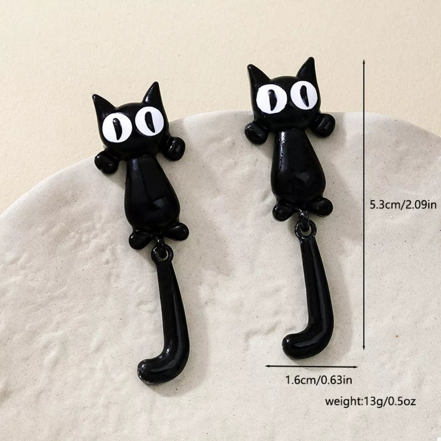 earrings in white with novelty and dangle
