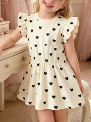 Children's cream heart print a-line mini dress with ruffle sleeves and elastic waist.