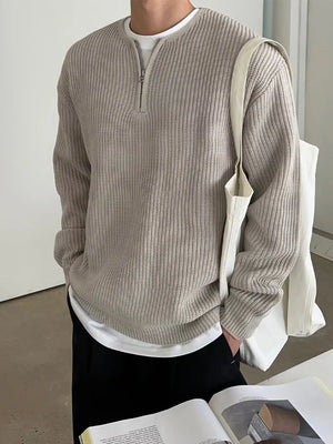 Khaki quarter zip relaxed fit pullover sweater with ribbed texture.