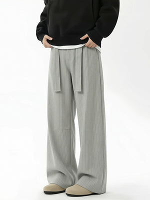 Sage wide-leg pants featuring belted and striped