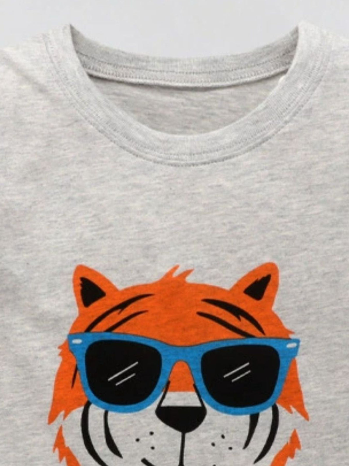 Grey cotton crew neck t-shirt with a cool tiger graphic wearing blue sunglasses.