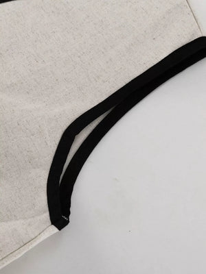 Lightweight linen blend tank top with black trim