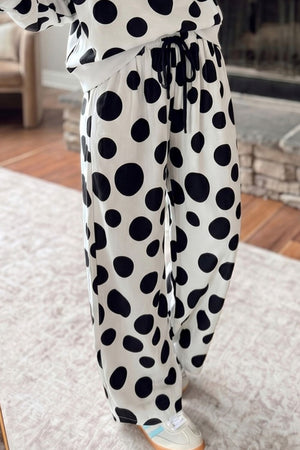 100% polyester Care instructions: Machine wash cold pajama set in Dot with relaxed silhouette