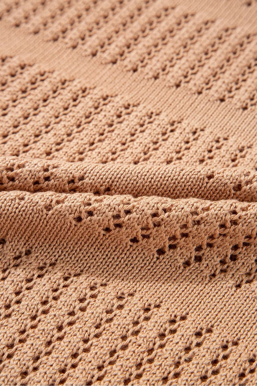 Sleek openwork knit sweater in tan with cotton blend fabric and elbow sleeves.