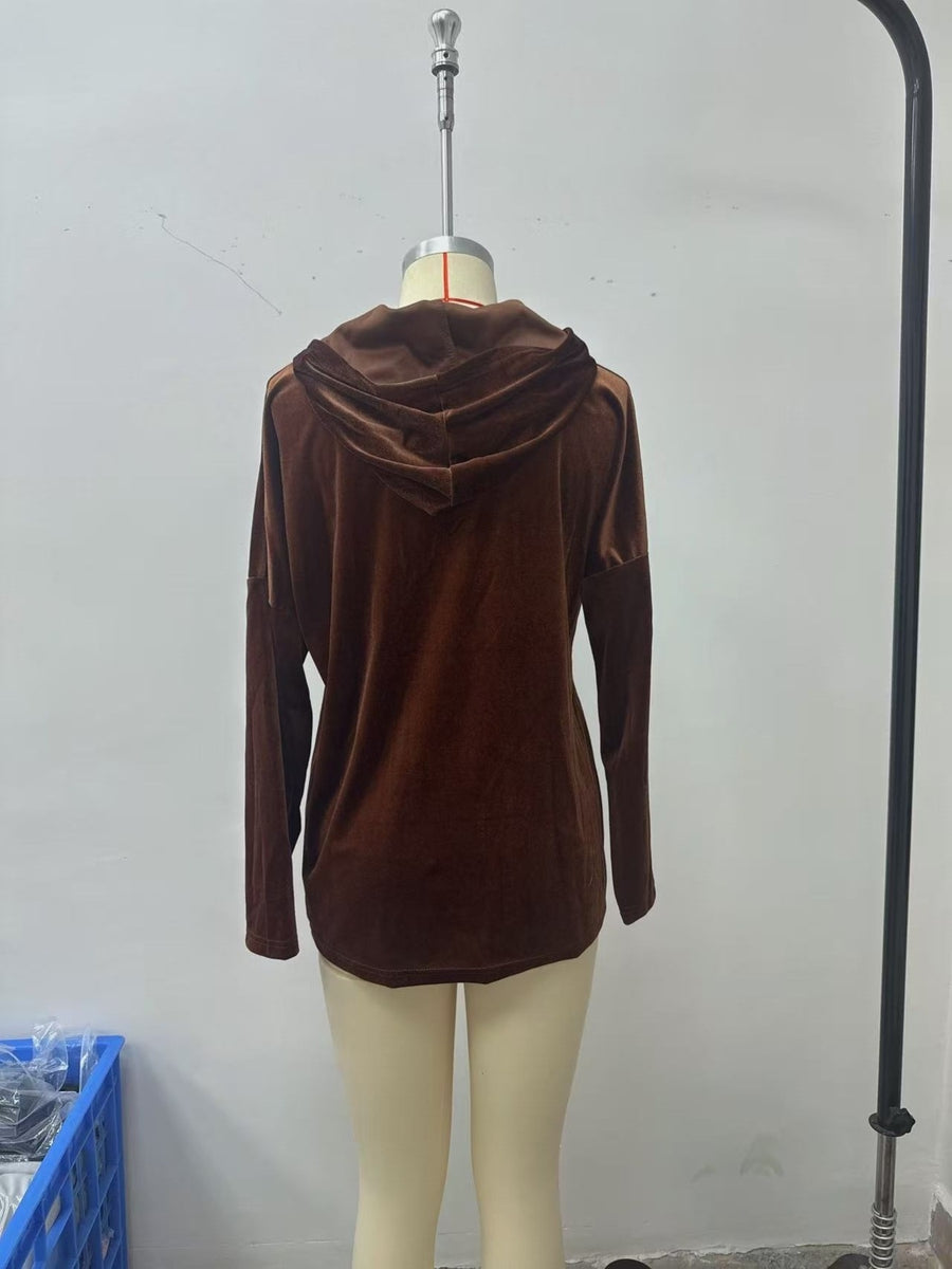 100% polyester Care instructions: Machine wash cold pullover hoodie in Burgundy with relaxed silhouette