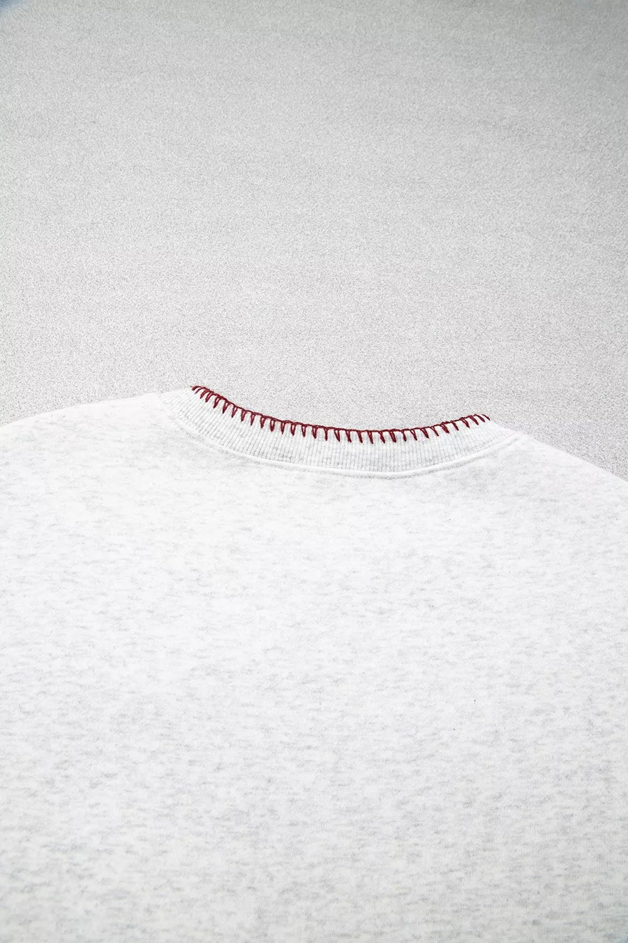 sweatshirt featuring graphic in Light Gray with 50% polyester, 50% cotton Care instructions: Machine wash cold texture