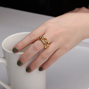 ring in gold featuring open ring and chain link fit