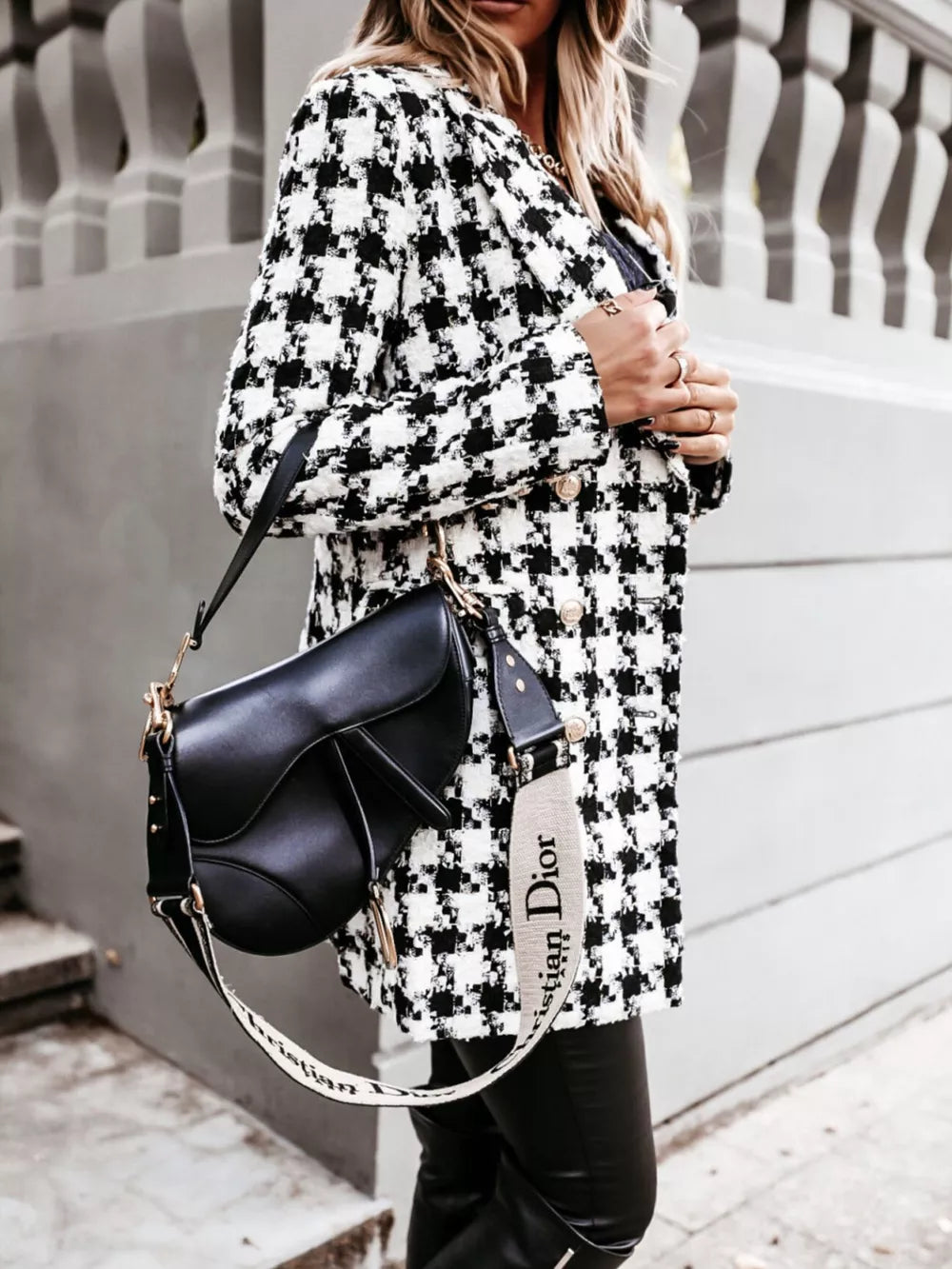 Black overcoat with thigh-length and button-front