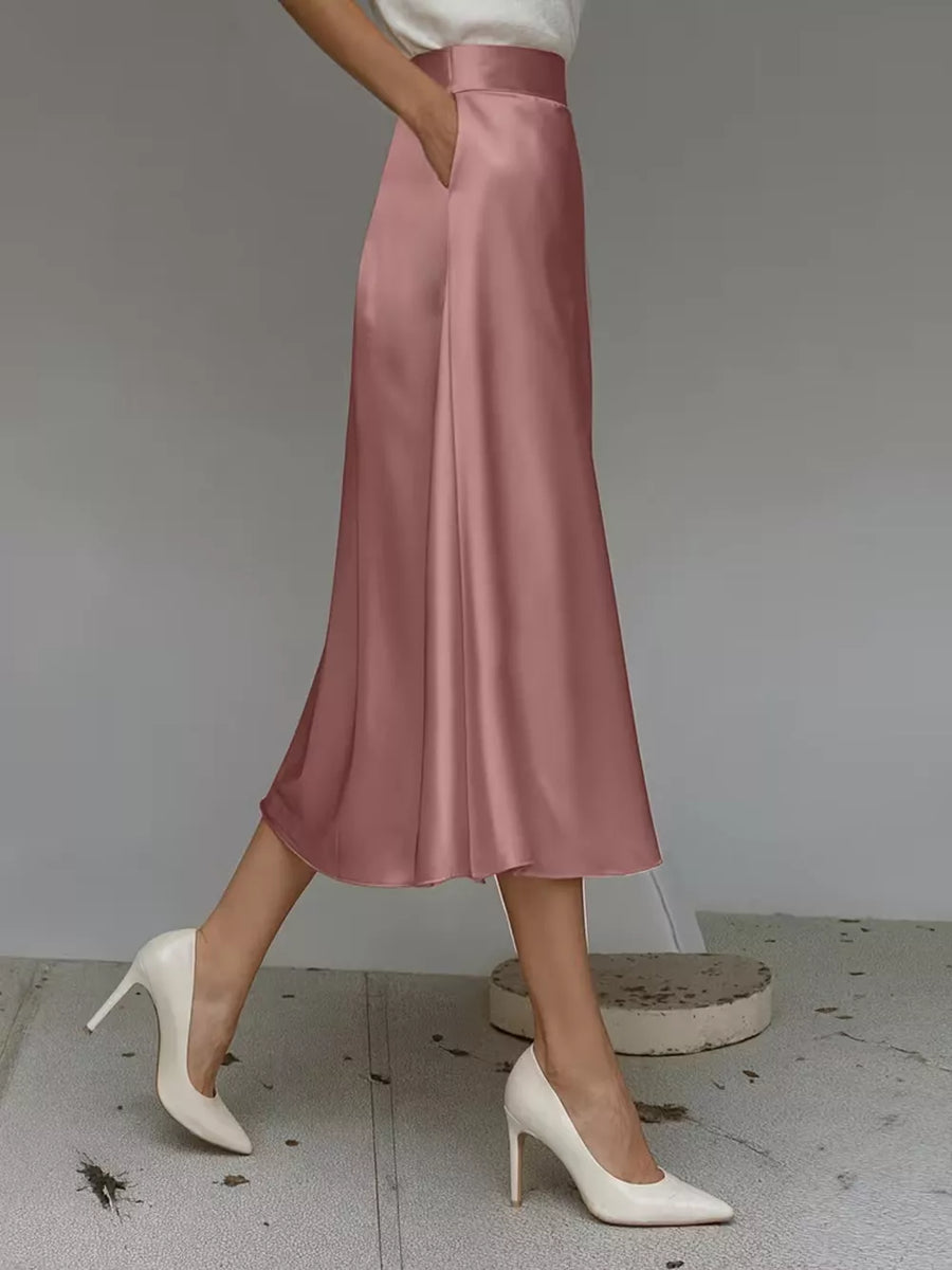 Pink satin A-line skirt with pockets, midi length