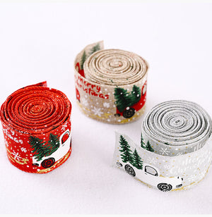 Red, beige, and light gray Christmas ribbon with festive truck and tree print.