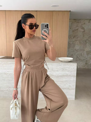 Mocha adjustable crop top and wide-leg pants set with drawstring details.