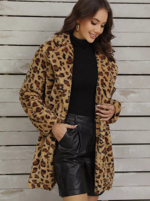 Cozy fuzzy teddy wrap coat in leopard print with a relaxed fit.