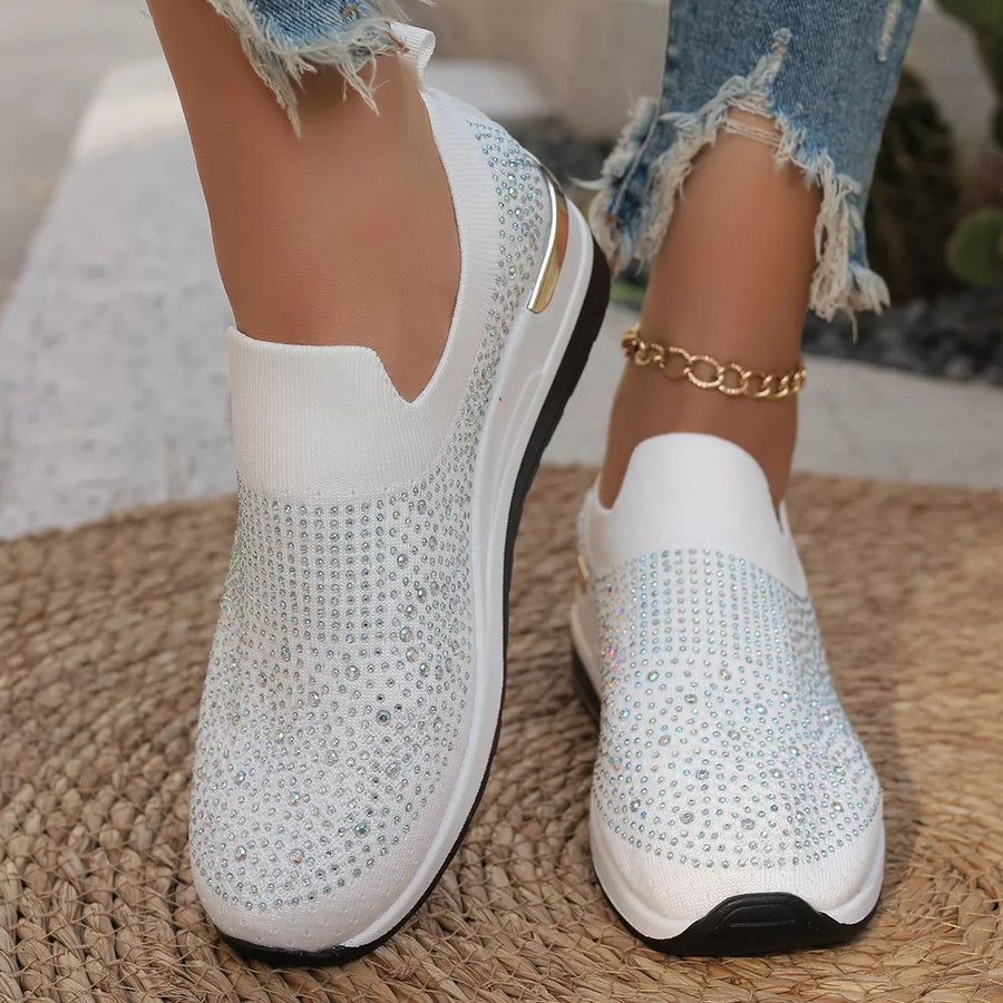 sneakers in white featuring rhinestone embellishment and slip-on fit
