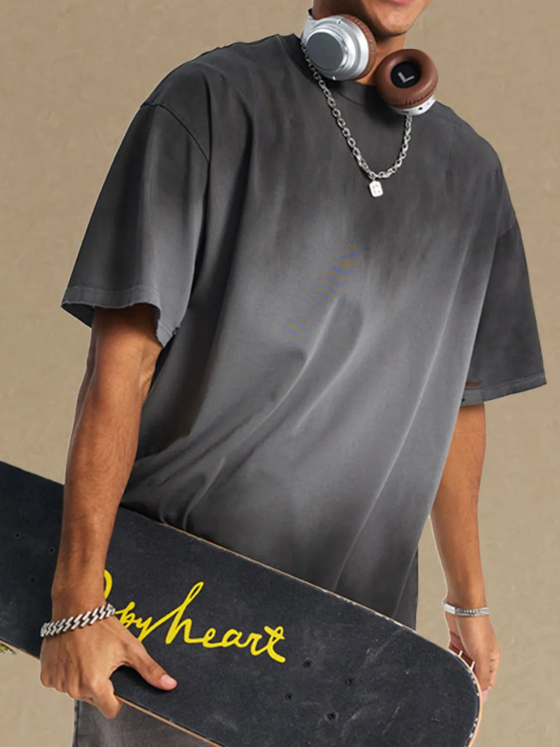 Faded ombre oversized tee in dark gray with a crew neck and short sleeves.