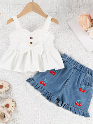White ruffle-trim bow top with cherry embroidered denim shorts set