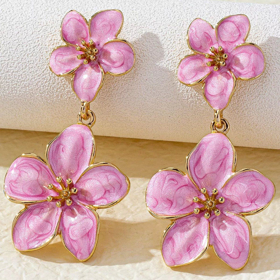 Pink flower dangle earrings with 18K gold plating and gold accents.