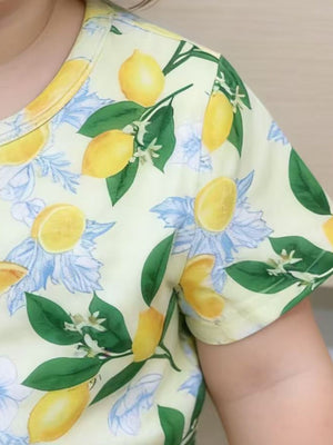 Toddler yellow lemon print outfit set with short sleeves and crew neck.