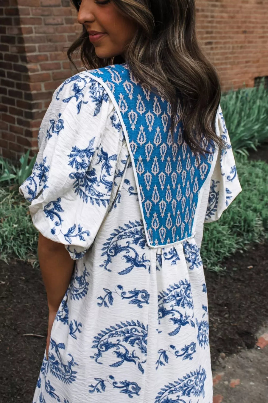 Maternity midi dress with blue floral print and patchwork detail, puff sleeves