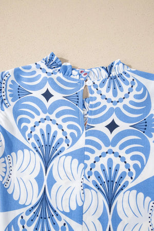 Botanic print ruffled mock neck dress with flutter sleeves and a keyhole back detail.