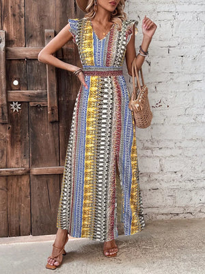 Bohemian maxi dress with ruffle sleeves, V-neck, and a colorful geometric print.