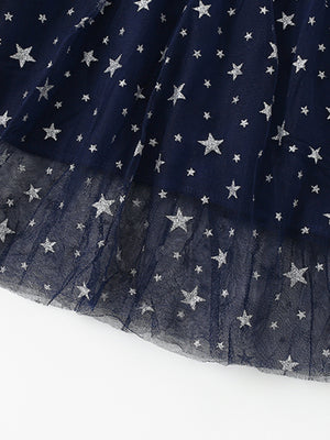 Navy tulle baby dress with silver stars and ruffle trim