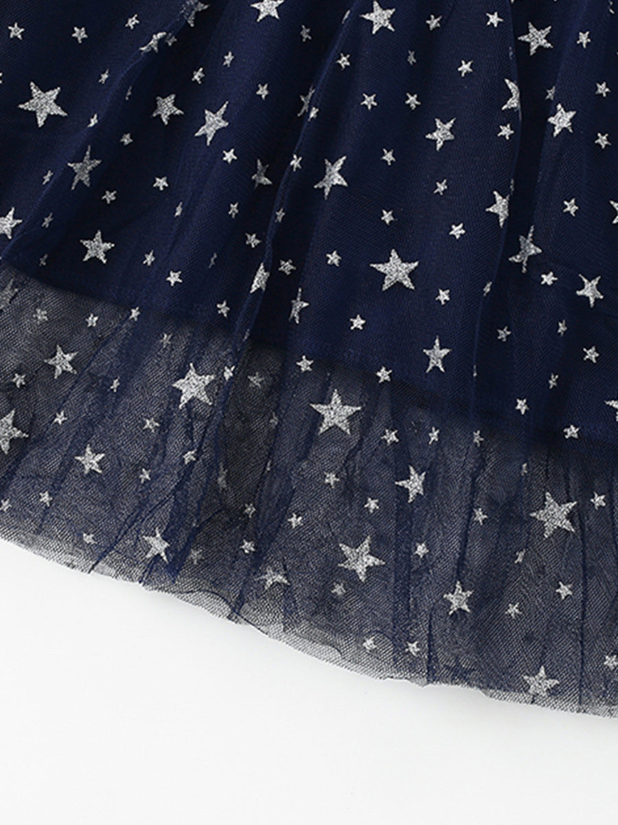 Navy tulle baby dress with silver stars and ruffle trim