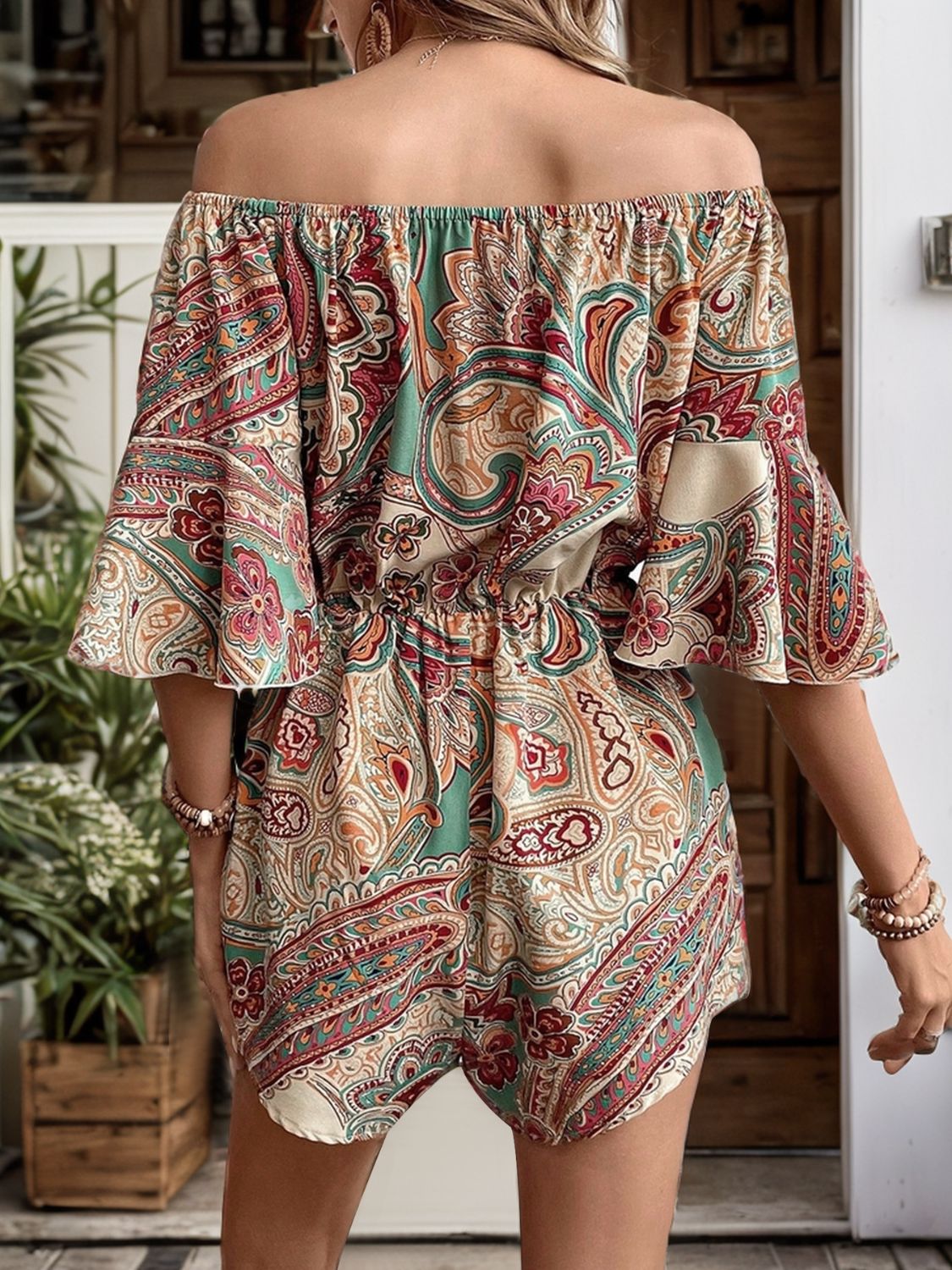 Paisley print off-the-shoulder romper with bell sleeves and elastic waist