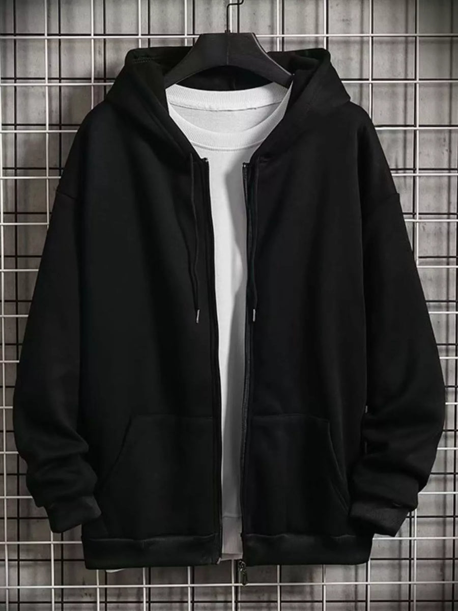 Black zip-up hoodie with drawstring hood and front pockets, layered over a white t-shirt.