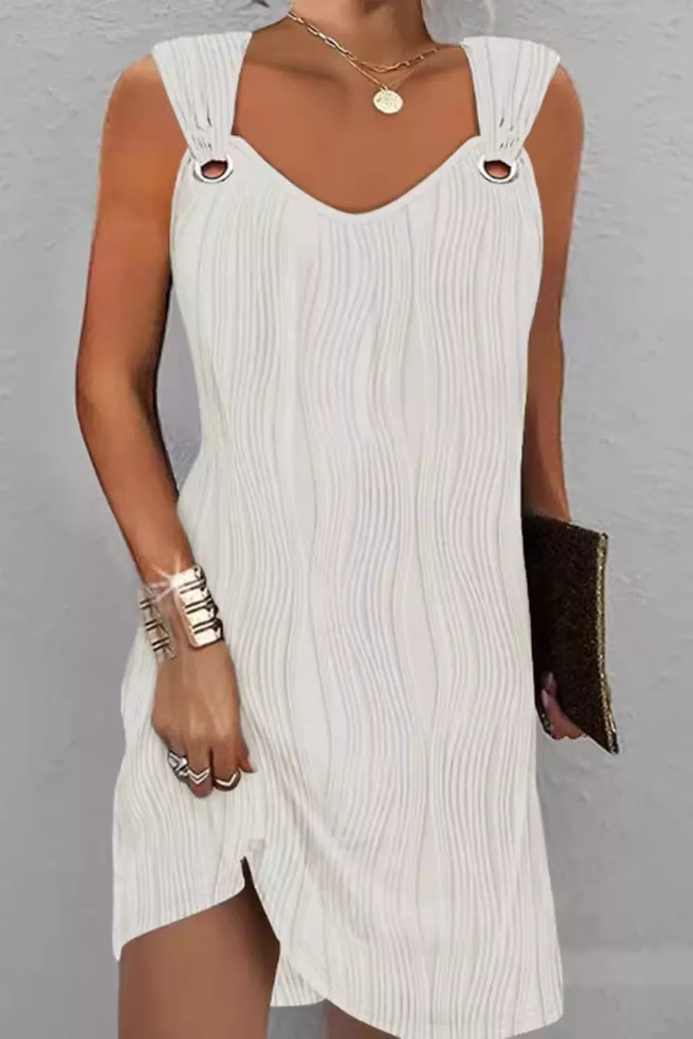 White textured V-neck mini dress with ring straps and asymmetrical hem