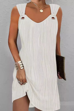 White textured V-neck mini dress with ring straps and asymmetrical hem