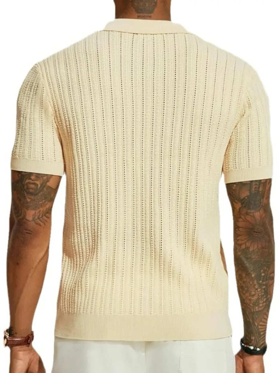 Cream textured knit polo shirt with openwork detail and short sleeves.