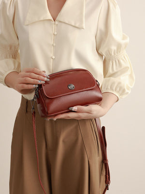 PU Leather Imported Size &amp crossbody bag in cognac with structured silhouette