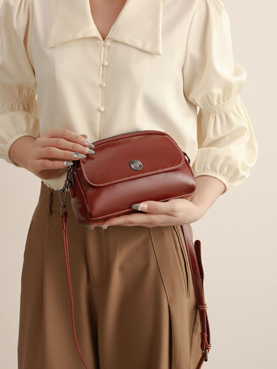 PU Leather Imported Size &amp crossbody bag in cognac with structured silhouette