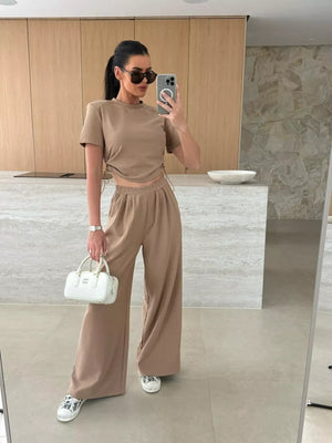 Mocha crop top and wide-leg pants set with adjustable drawstring details.
