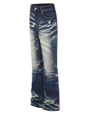Distressed dark wash flare jeans with button fly and pocket details.