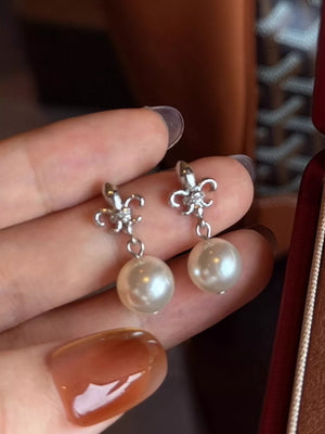 Synthetic Pearl,Alloy,925 silver needle Care instructions: Avoid wearing during earrings in Silver with drop silhouette