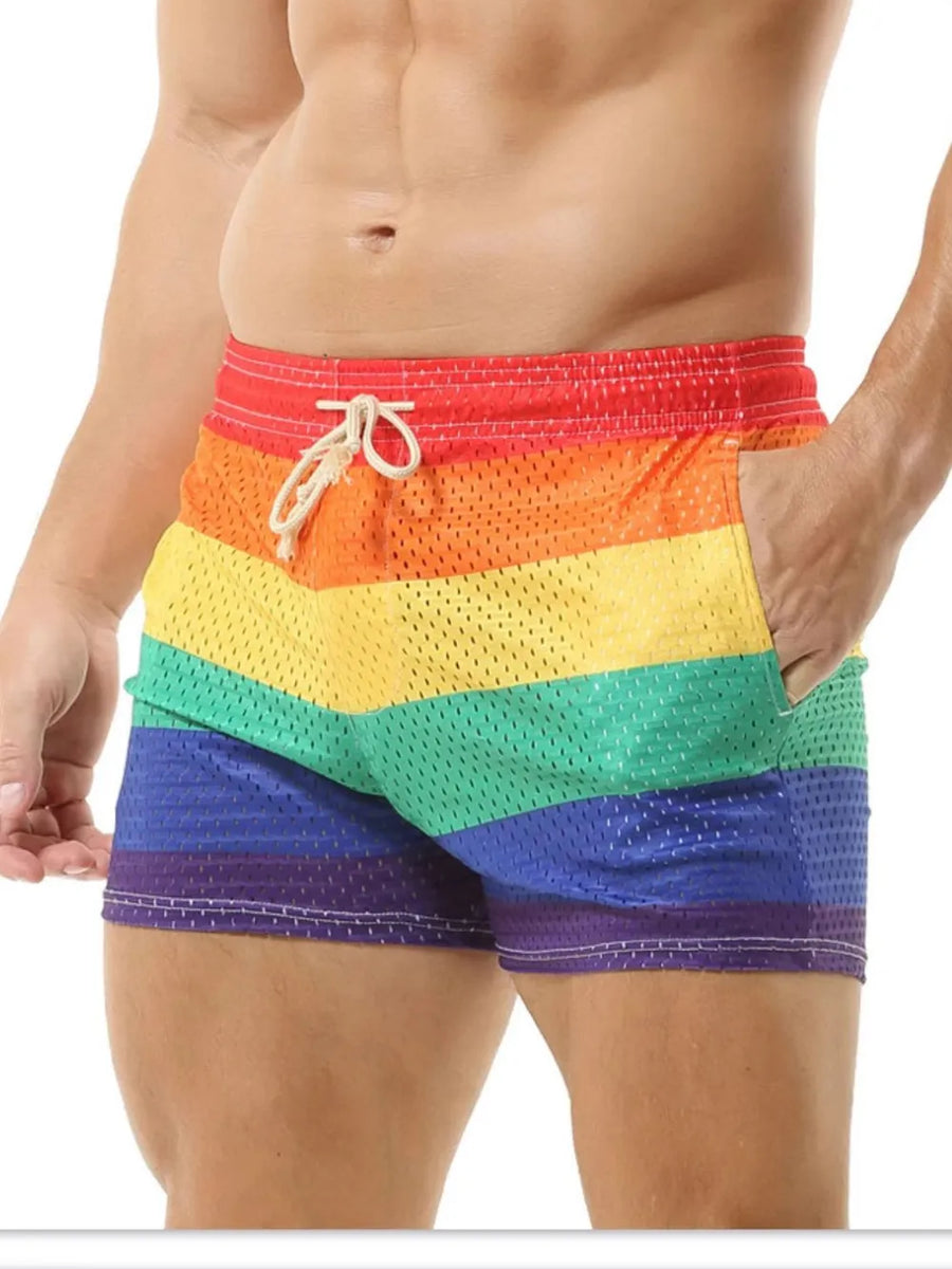 Rainbow mesh drawstring swim shorts with white stitching and pockets.