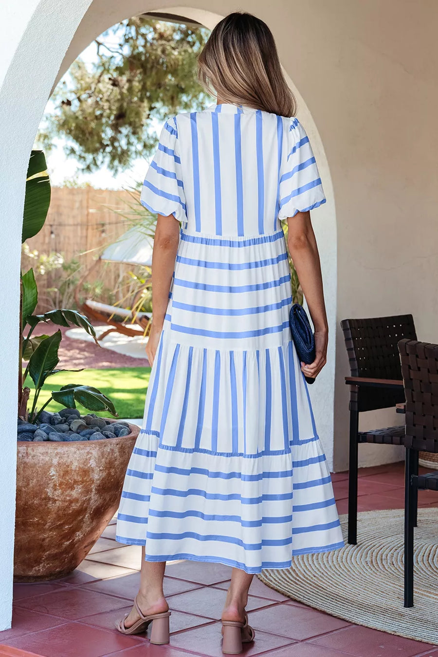 Tiered white and blue striped midi dress with ricrac trim and puff sleeves.