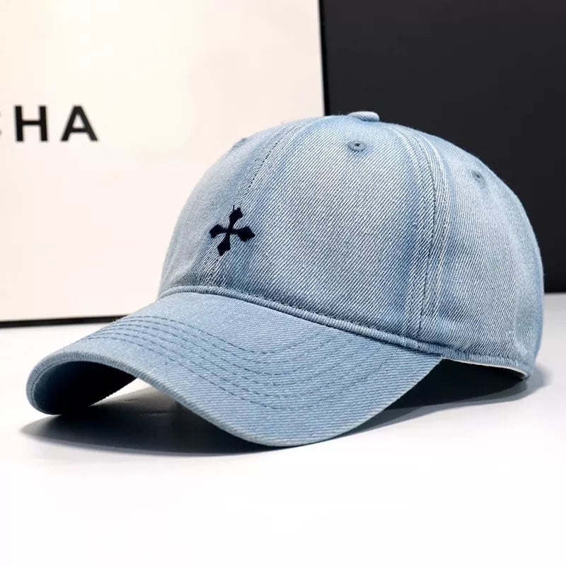 Light blue denim baseball hat with embroidered detail